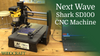 Next Wave Shark SD100 CNC router on wooden workbench with laptop for woodworking control setup