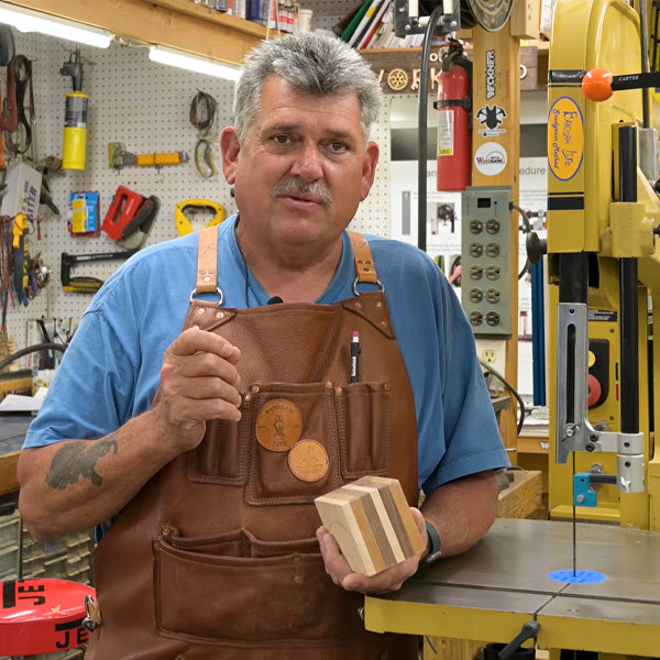 Alex Snodgrass shown with block of wood preparing to make a bandsaw box.