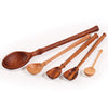 Set of six handcrafted wooden spoons with varied wood types and turned handles on white background