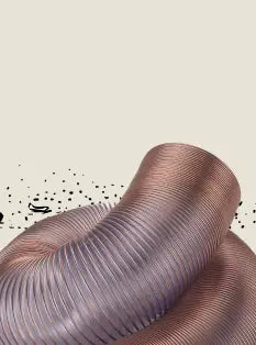 Close-up of a textured, ribbed surface with a neutral background