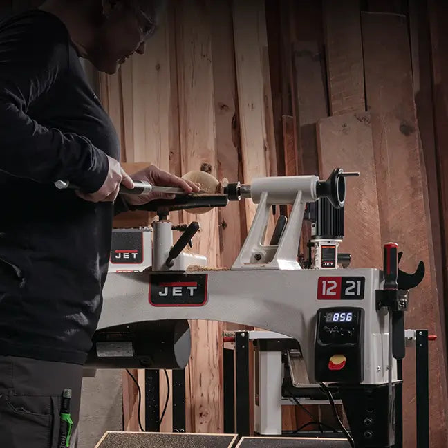 Person using a JET branded workbench in a workshop setting