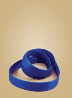 Blue resistance band on a beige background