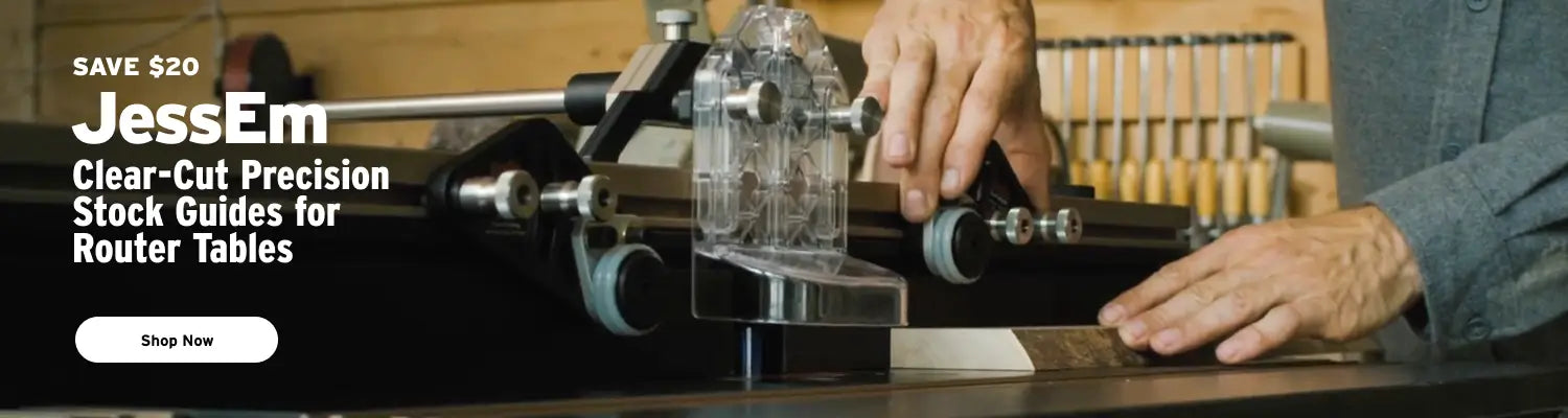 Router table with JessEm clear-cut precision stock guides and a person operating it.
