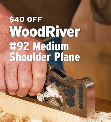 A close-up of a hand using a WoodRiver #92 Medium Shoulder Plane to cut wood shavings from a light wood board, with promotional text overlay reading '$40 OFF WoodRiver #92 Medium Shoulder Plane'.
