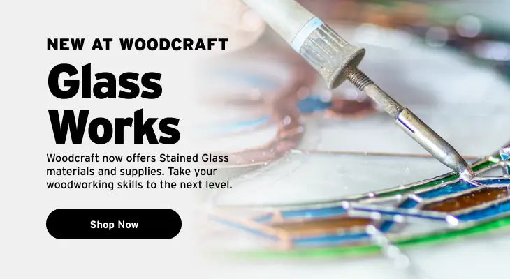 Promotional graphic for Woodcraft's 'Glass Works' featuring a close-up of a soldering iron working on stained glass, with bold black text on a white background and a black 'Shop Now' button.
