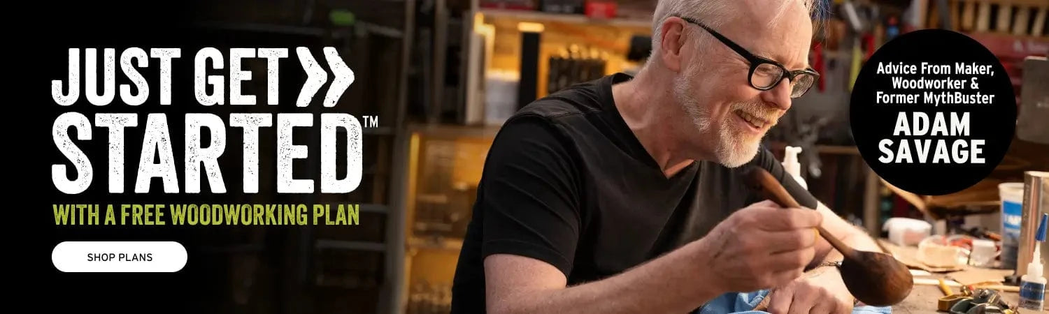 Man working with wood in a workshop, promoting Adam Savage's woodworking plan.