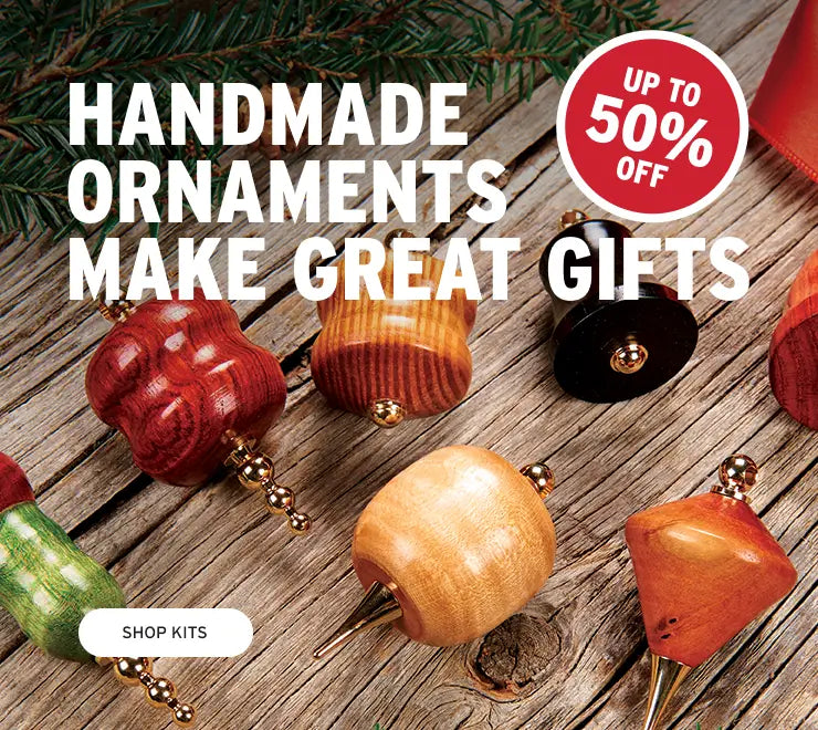 Handmade ornaments on a wooden surface with promotional text and discount offer.