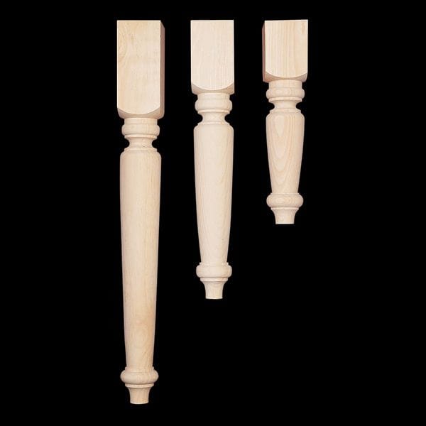 three unfinished wooden table legs
